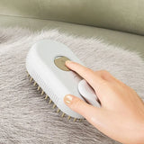 Steam grooming brush shown in mocha and cloud white colourways